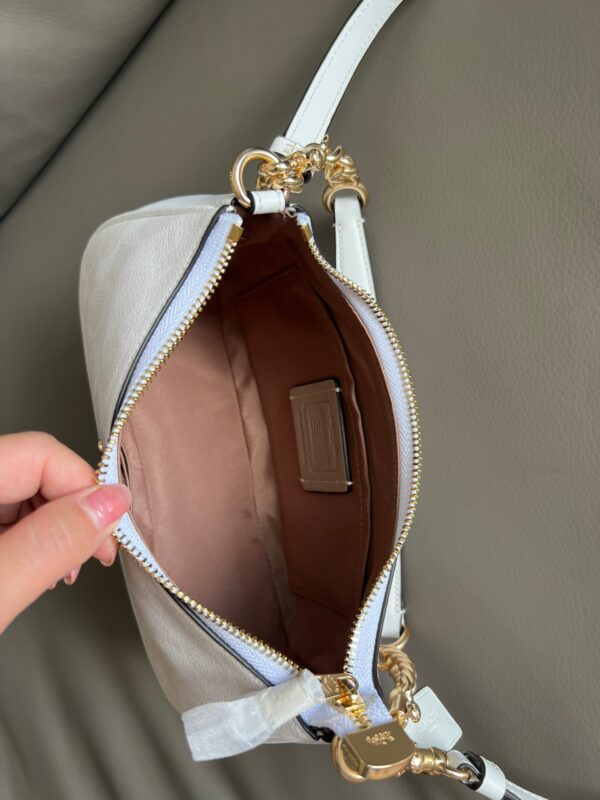 110d64bf.jpg Teri Mini Crossbody Bag In Signature Canvas