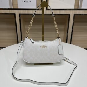 584433e2.jpg Teri Mini Crossbody Bag In Signature Canvas