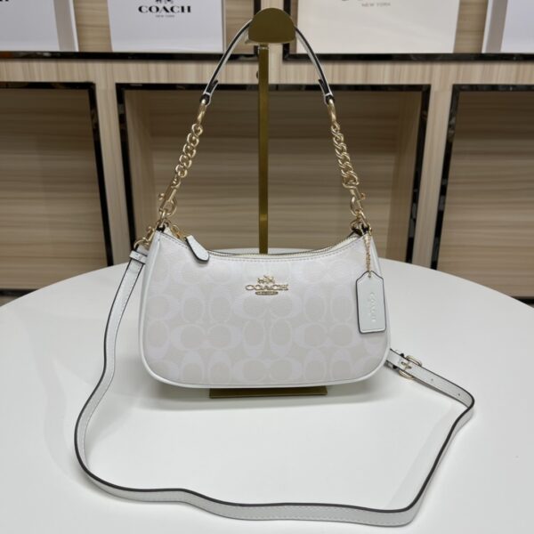 584433e2.jpg Teri Mini Crossbody Bag In Signature Canvas