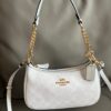 67f7de94.jpg Teri Mini Crossbody Bag In Signature Canvas