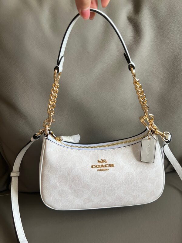 67f7de94.jpg Teri Mini Crossbody Bag In Signature Canvas