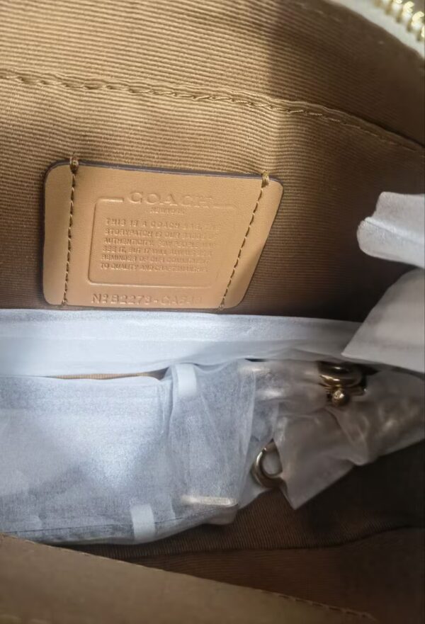 a616dea9.jpg Teri Mini Crossbody Bag In Signature Canvas
