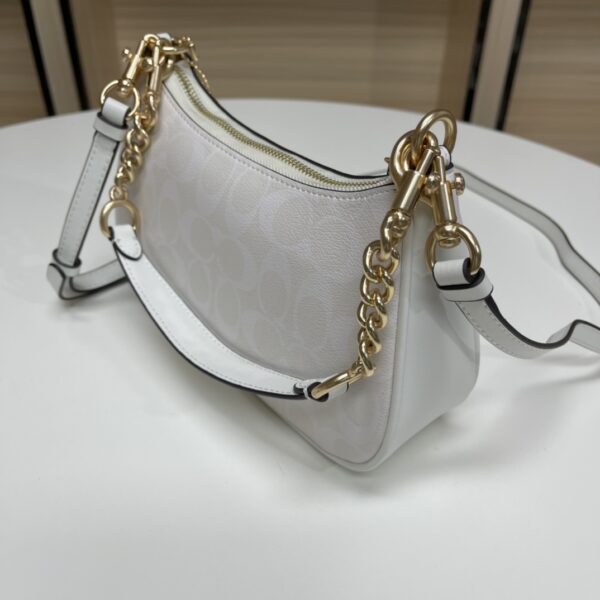 b9bfc442.jpg Teri Mini Crossbody Bag In Signature Canvas