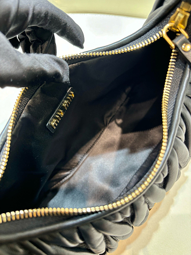 Wander matelassé nappa leather hobo bag